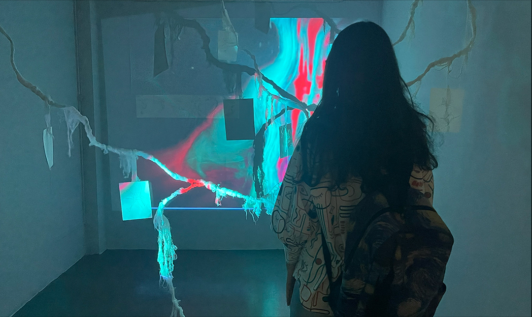Visitors immersed in projection